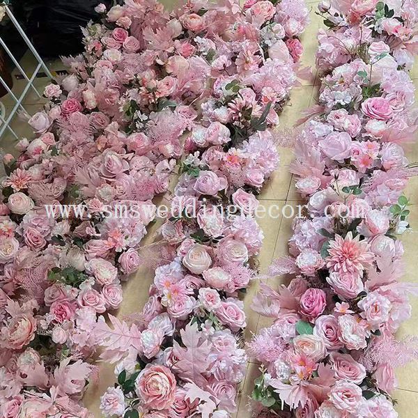 pink telephone booth with flowers